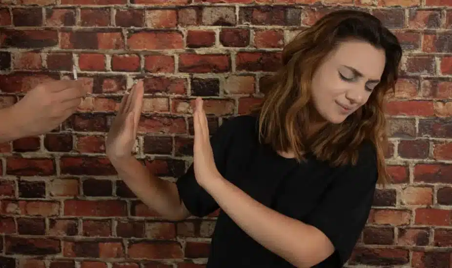 Teenage girl refusing cigar